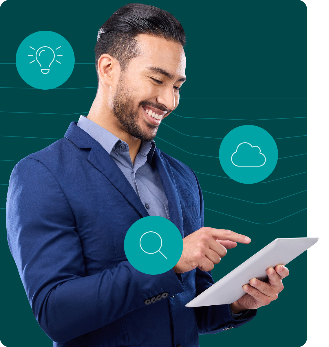 Photo of a young professional male standing and smiling while using an ipad.